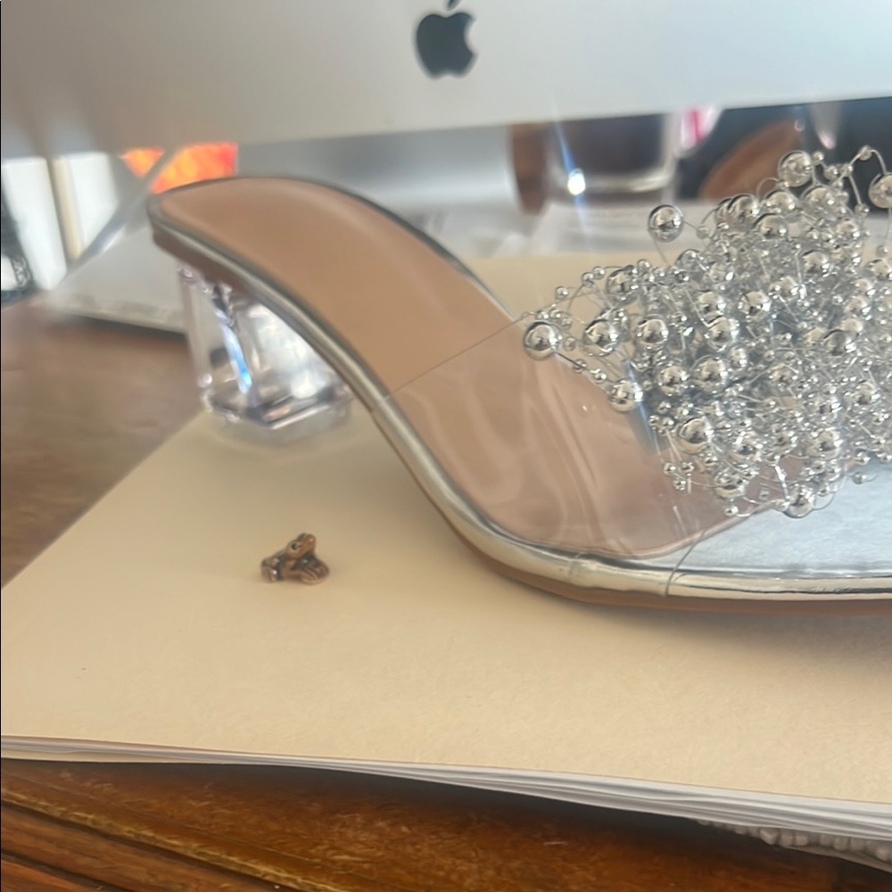 Elegant  clear and silver Women's sandals with heels.